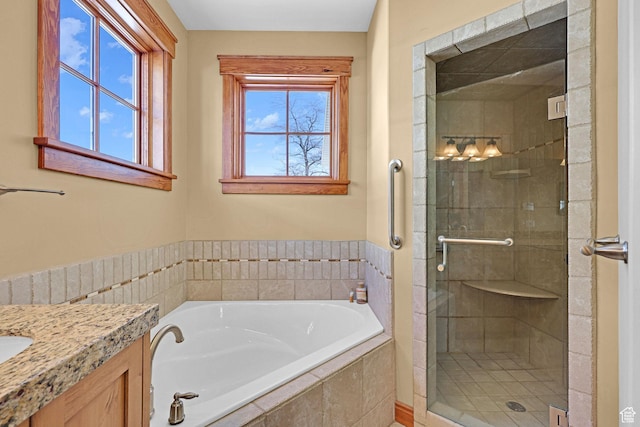 315 S Bear Lake Blvd, Garden City, UT 84028 - full bathroom with a stall shower, a bath, and vanity