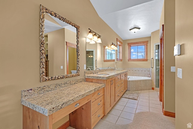 315 S Bear Lake Blvd, Garden City, UT 84028 - full bath with a bath, tile patterned flooring, vanity, a shower with shower door, and baseboards
