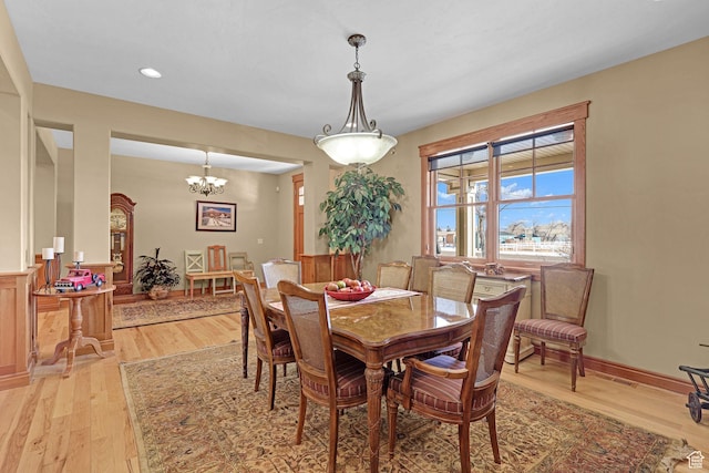 315 S Bear Lake Blvd, Garden City, UT 84028 - dining space featuring light wood-type flooring, a chandelier, and recessed lighting