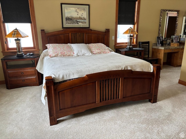 315 S Bear Lake Blvd, Garden City, UT 84028 - bedroom featuring light carpet and multiple windows
