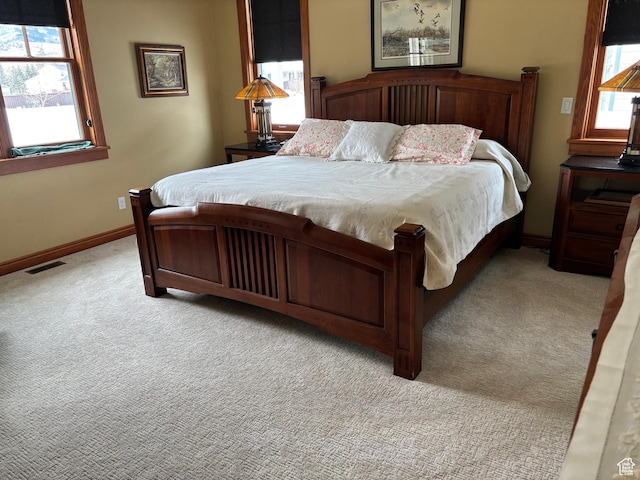 315 S Bear Lake Blvd, Garden City, UT 84028 - bedroom with light colored carpet and baseboards