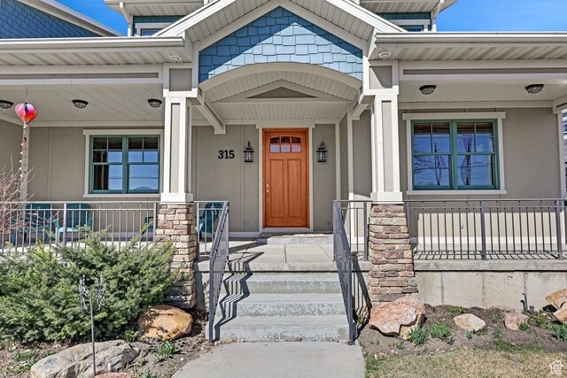315 S Bear Lake Blvd, Garden City, UT 84028 - view of exterior entry with a porch