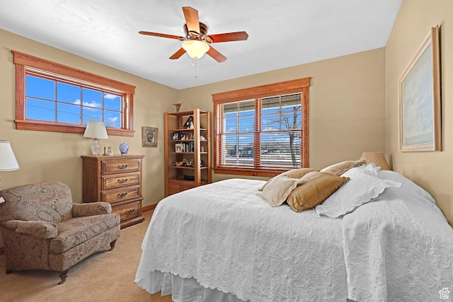 315 S Bear Lake Blvd, Garden City, UT 84028 - bedroom featuring light colored carpet and ceiling fan