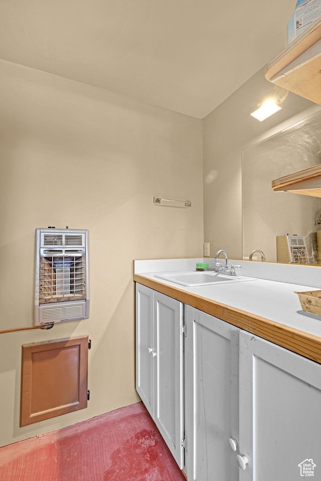 315 S Bear Lake Blvd, Garden City, UT 84028 - bathroom featuring heating unit and vanity