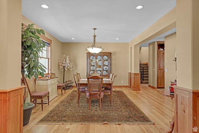 315 S Bear Lake Blvd, Garden City, UT 84028 - dining space with light wood-type flooring, stairway, recessed lighting, and baseboards