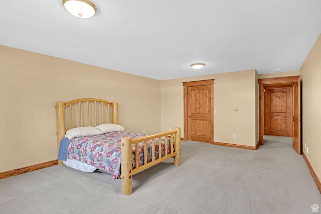 315 S Bear Lake Blvd, Garden City, UT 84028 - bedroom with light colored carpet and baseboards
