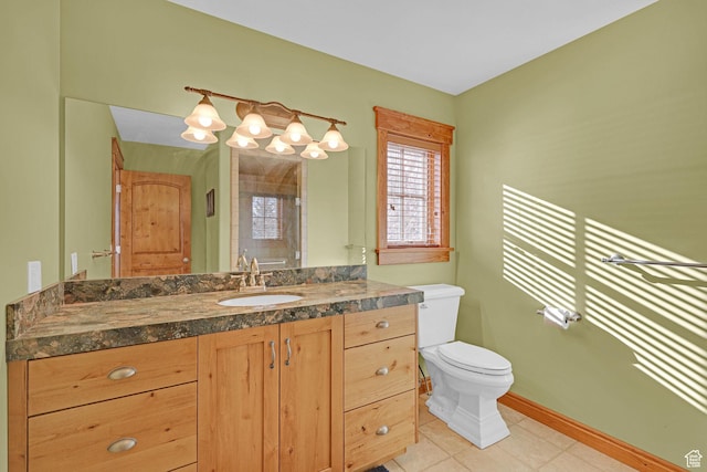 315 S Bear Lake Blvd, Garden City, UT 84028 - bathroom featuring toilet, tile patterned floors, vanity, and baseboards