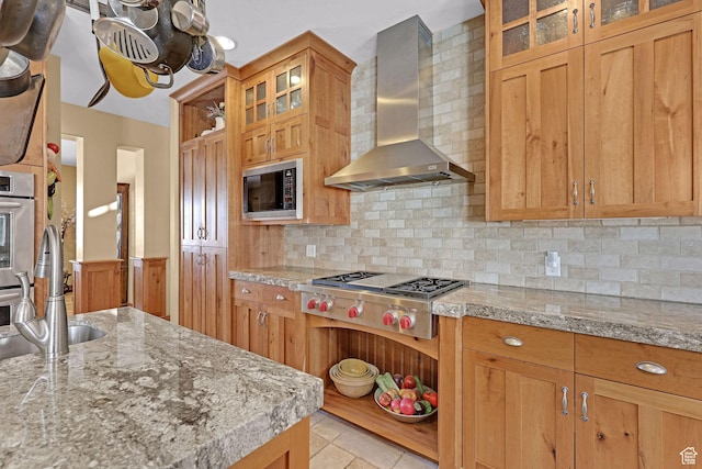 315 S Bear Lake Blvd, Garden City, UT 84028 - kitchen featuring wall chimney exhaust hood, built in microwave, stainless steel gas stovetop, a sink, and light tile patterned flooring