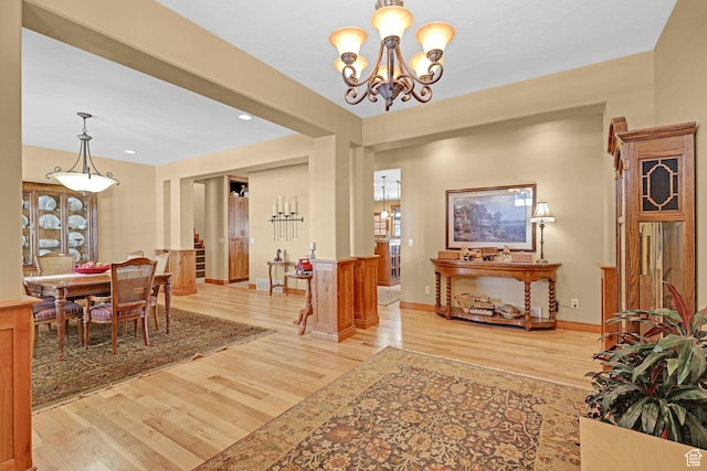315 S Bear Lake Blvd, Garden City, UT 84028 - dining space with light wood-style floors, a chandelier, recessed lighting, and baseboards