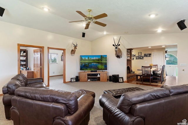 712 S 6150 W, Ogden, UT 84404 - living room featuring ceiling fan, light colored carpet, a healthy amount of sunlight, and vaulted ceiling