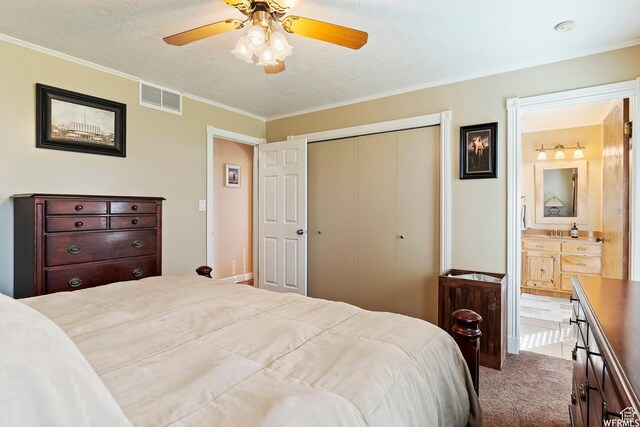 712 S 6150 W, Ogden, UT 84404 - bedroom featuring carpet flooring, crown molding, a textured ceiling, ceiling fan, and connected bathroom