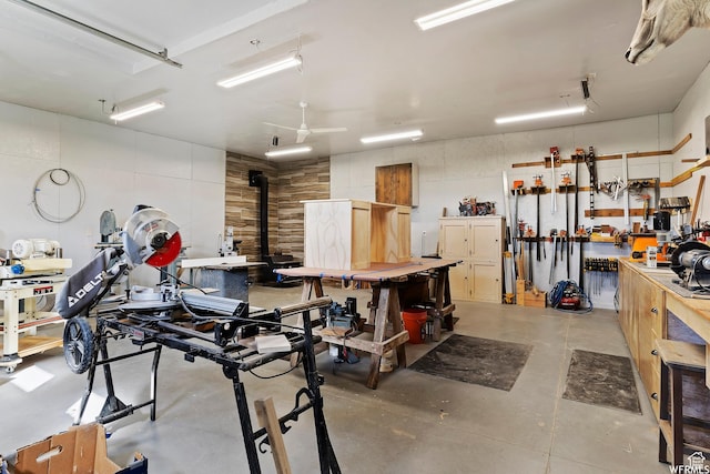 712 S 6150 W, Ogden, UT 84404 - garage with a wood stove and a workshop area
