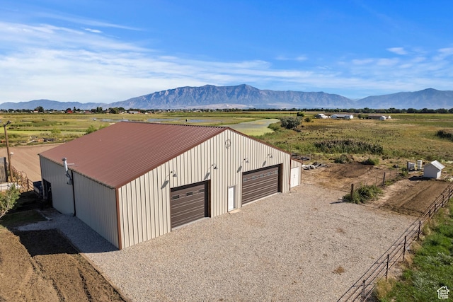 712 S 6150 W, Ogden, UT 84404 - garage featuring a mountain view and a rural view