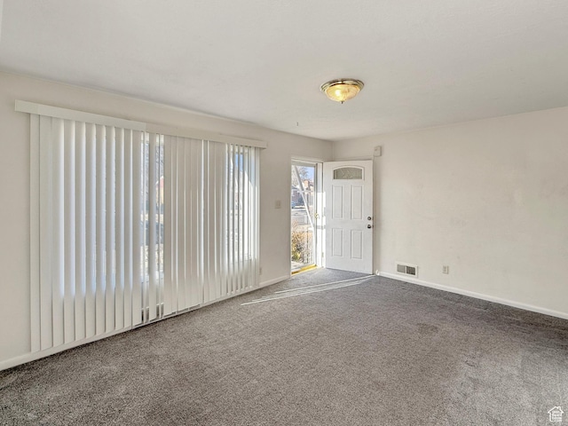 5840 S 2625 W, Roy, UT 84067 - carpeted spare room featuring baseboards and visible vents