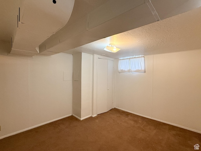 5840 S 2625 W, Roy, UT 84067 - basement with carpet flooring, baseboards, and a textured ceiling
