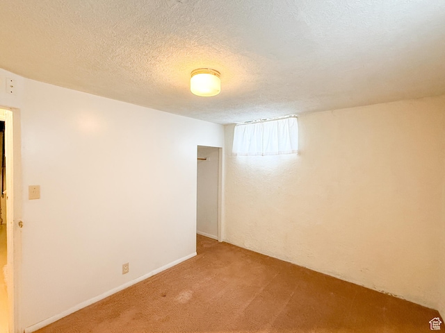 5840 S 2625 W, Roy, UT 84067 - spare room with light colored carpet and a textured ceiling