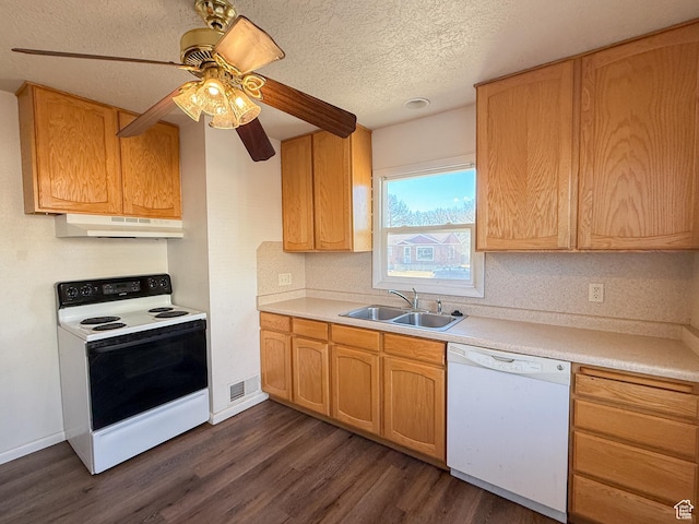 5840 S 2625 W, Roy, UT 84067 - kitchen featuring light countertops, a sink, dark wood-style floors, under cabinet range hood, and white appliances
