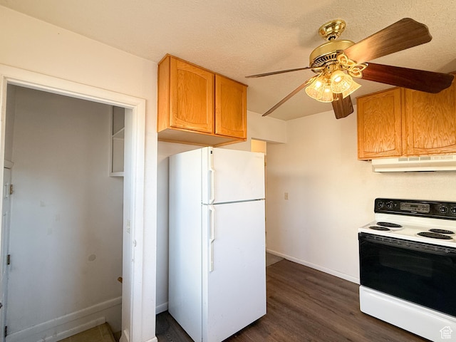 5840 S 2625 W, Roy, UT 84067 - kitchen featuring white appliances, baseboards, a ceiling fan, dark wood finished floors, and under cabinet range hood