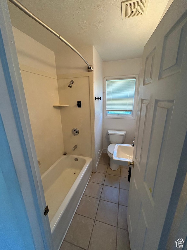 5840 S 2625 W, Roy, UT 84067 - full bath with a textured ceiling, toilet, tile patterned floors, bathtub / shower combination, and a sink