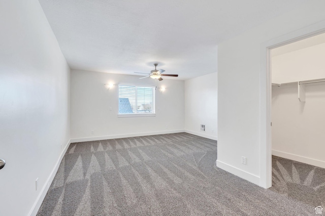 interior space featuring ceiling fan