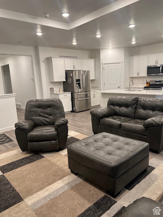 422 W 1360 N, Tooele, UT 84074 - living area with light wood-style flooring and recessed lighting
