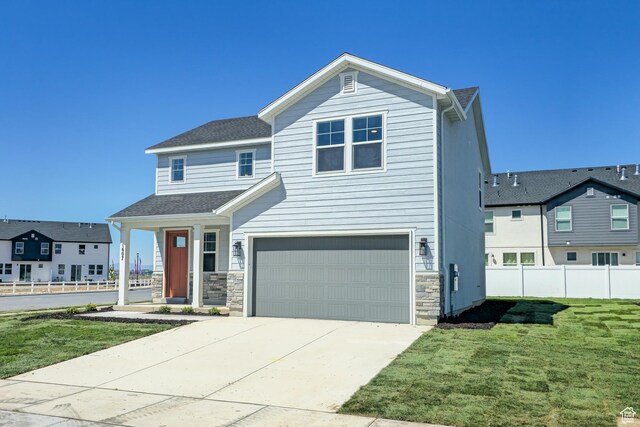 1607 N 800 W, Salem, UT 84653 - view of front facade with an attached garage, driveway, and stone siding