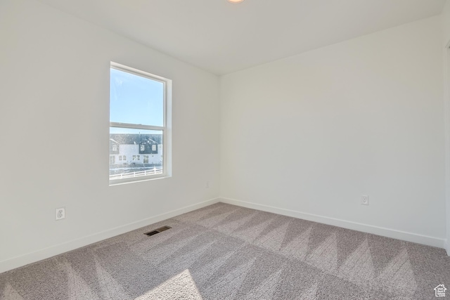 view of carpeted spare room