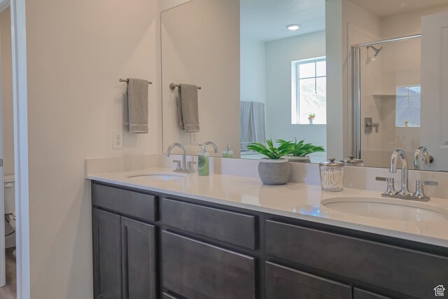 1607 N 800 W, Salem, UT 84653 - bathroom with a stall shower, double vanity, and toilet