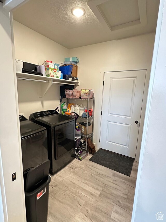 3 W 825 S, Willard, UT 84340 - laundry room featuring independent washer and dryer, attic access, light wood-style flooring, and a textured ceiling