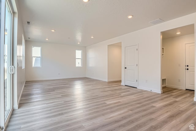 1617 N 800 W, Salem, UT 84653 - unfurnished room featuring light wood-type flooring, recessed lighting, and baseboards