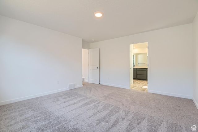 1617 N 800 W, Salem, UT 84653 - unfurnished bedroom featuring light carpet, baseboards, and connected bathroom