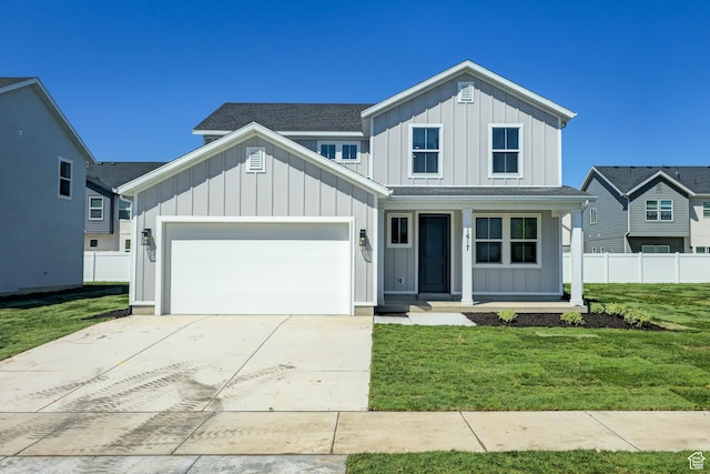 1617 N 800 W, Salem, UT 84653 - view of front of property with board and batten siding, covered porch, a garage, and concrete driveway
