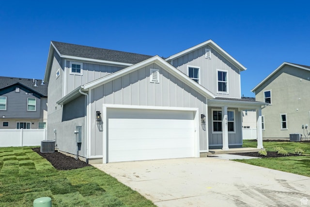 1617 N 800 W, Salem, UT 84653 - traditional-style home featuring board and batten siding, an attached garage, driveway, and cooling unit