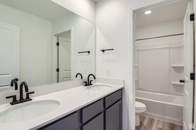 1617 N 800 W, Salem, UT 84653 - full bath featuring toilet, wood finished floors, double vanity, tub / shower combination, and recessed lighting