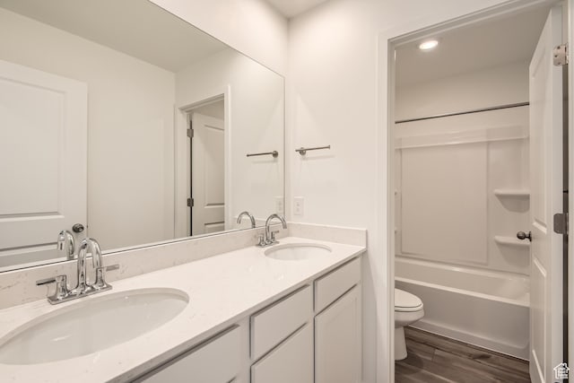 1639 N 800 W, Salem, UT 84653 - bathroom with toilet, wood finished floors, double vanity, and shower / washtub combination