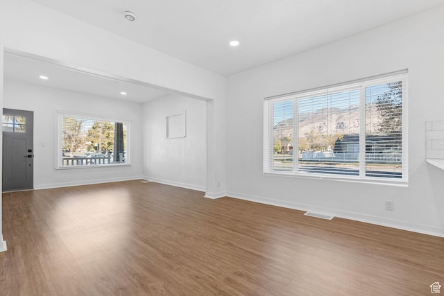 789 27th St, Ogden, UT 84403 - unfurnished living room with hardwood / wood-style floors