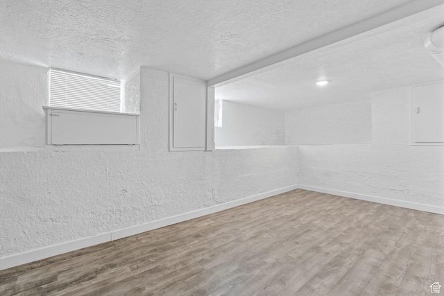 789 27th St, Ogden, UT 84403 - unfurnished room with hardwood / wood-style flooring and a textured ceiling