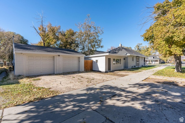 789 27th St, Ogden, UT 84403 - ranch-style home with a garage and an outdoor structure