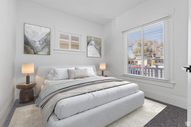 789 27th St, Ogden, UT 84403 - carpeted bedroom featuring multiple windows