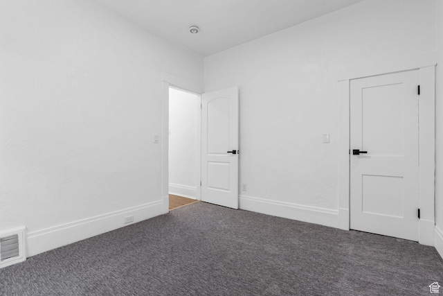 789 27th St, Ogden, UT 84403 - empty room with dark colored carpet
