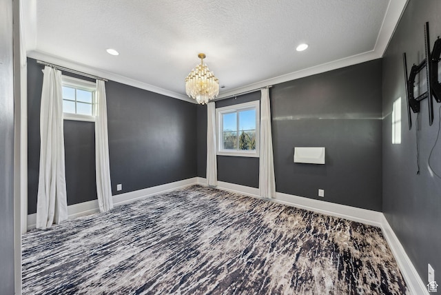 2905 E Denmark Dr, Cottonwood Heights, UT 84121 - spare room with ornamental molding, a textured ceiling, a notable chandelier, and plenty of natural light