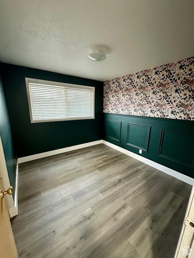 empty room featuring light hardwood / wood-style flooring