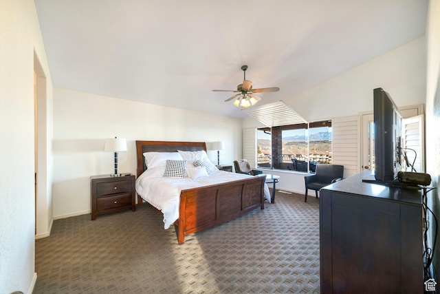 carpeted bedroom featuring baseboards, a ceiling fan, and lofted ceiling