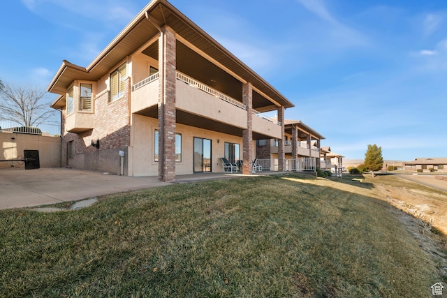 rear view of property with a patio