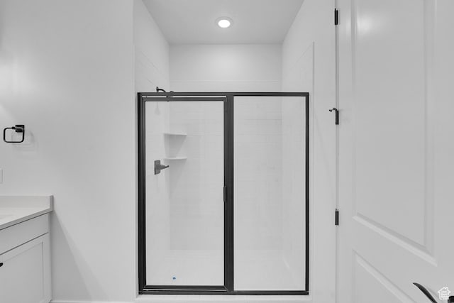 1162 N 375th St W Unit 22, Harrisville, UT 84404 - bathroom featuring recessed lighting, a stall shower, and vanity