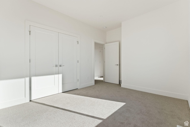 1618 S Main St Unit 2, Salt Lake City, UT 84115 - unfurnished bedroom with light colored carpet and a closet