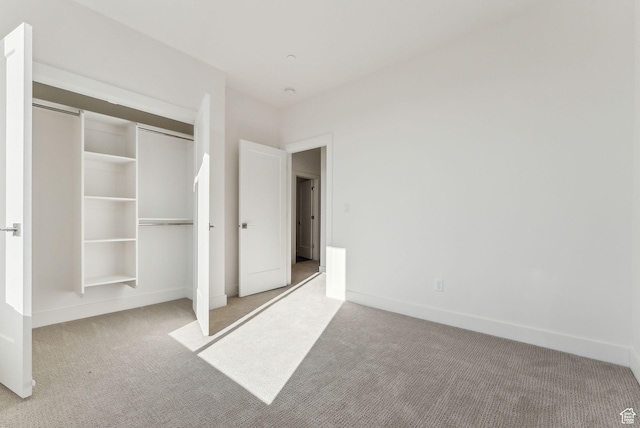 1618 S Main St Unit 2, Salt Lake City, UT 84115 - unfurnished bedroom featuring light carpet and a closet