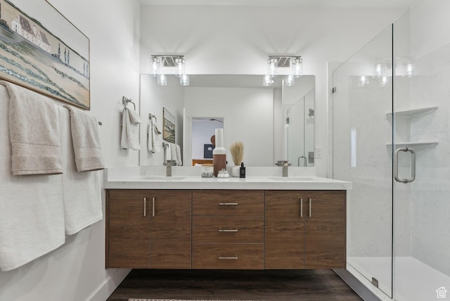 1618 S Main St Unit 2, Salt Lake City, UT 84115 - bathroom featuring hardwood / wood-style flooring, vanity, and a shower with shower door