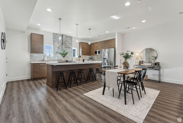 1618 S Main St Unit 2, Salt Lake City, UT 84115 - dining area with sink and dark wood-type flooring