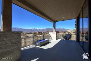 2066 E Oquirrh Mountain Cir, Heber City, UT 84032 - view of patio / terrace with a balcony and a mountain view
